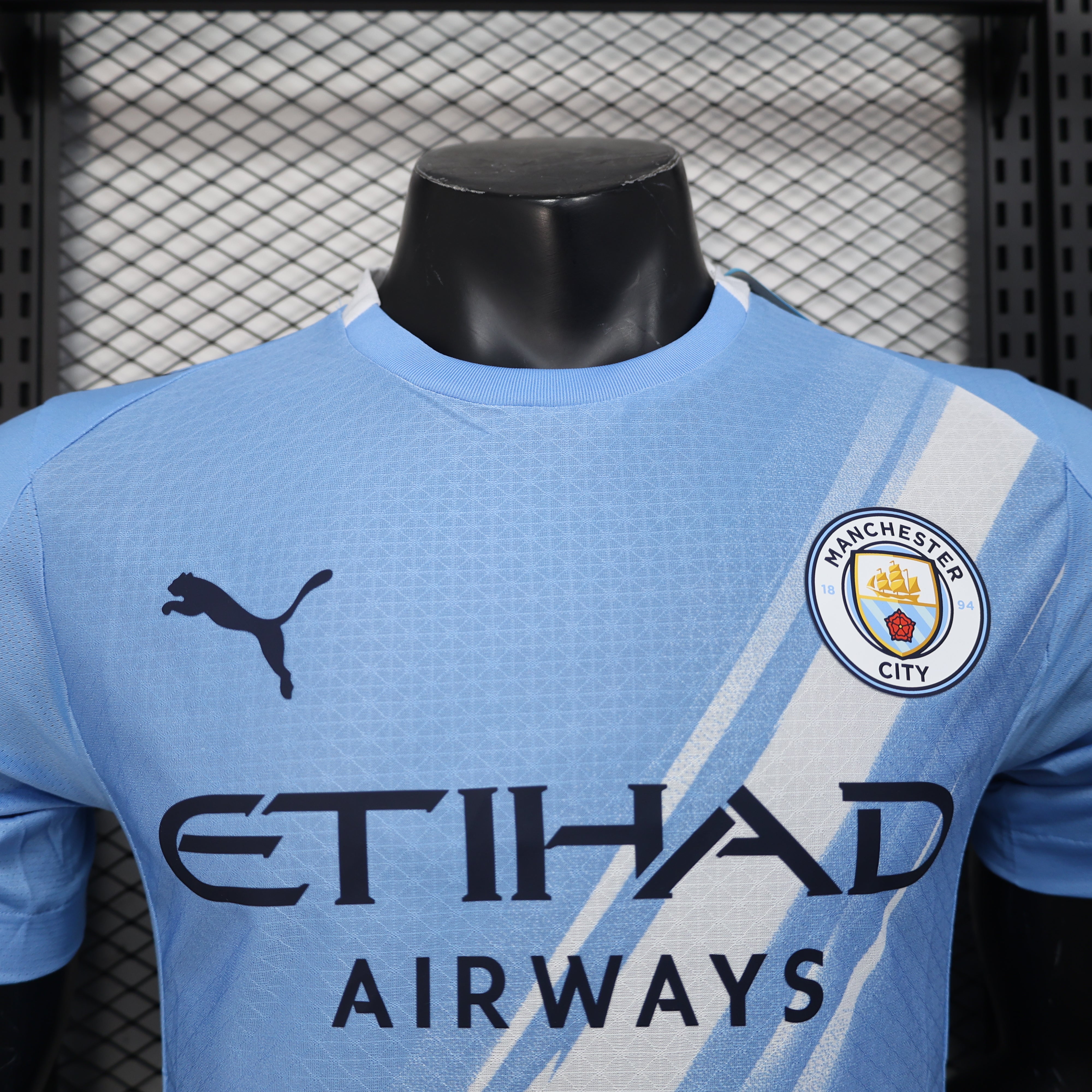 Light blue Manchester City 25/26 home player jersey with white stripe