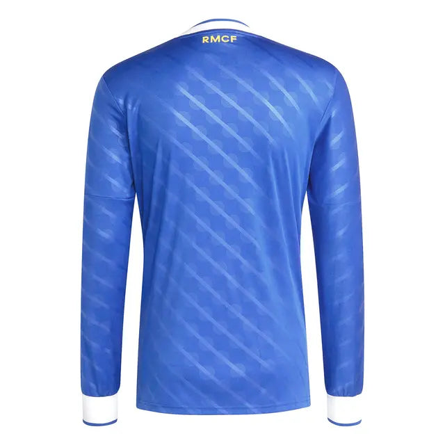 Royal blue Real Madrid 25/26 long sleeve third jersey with white stripes and gold RMCF embroidery